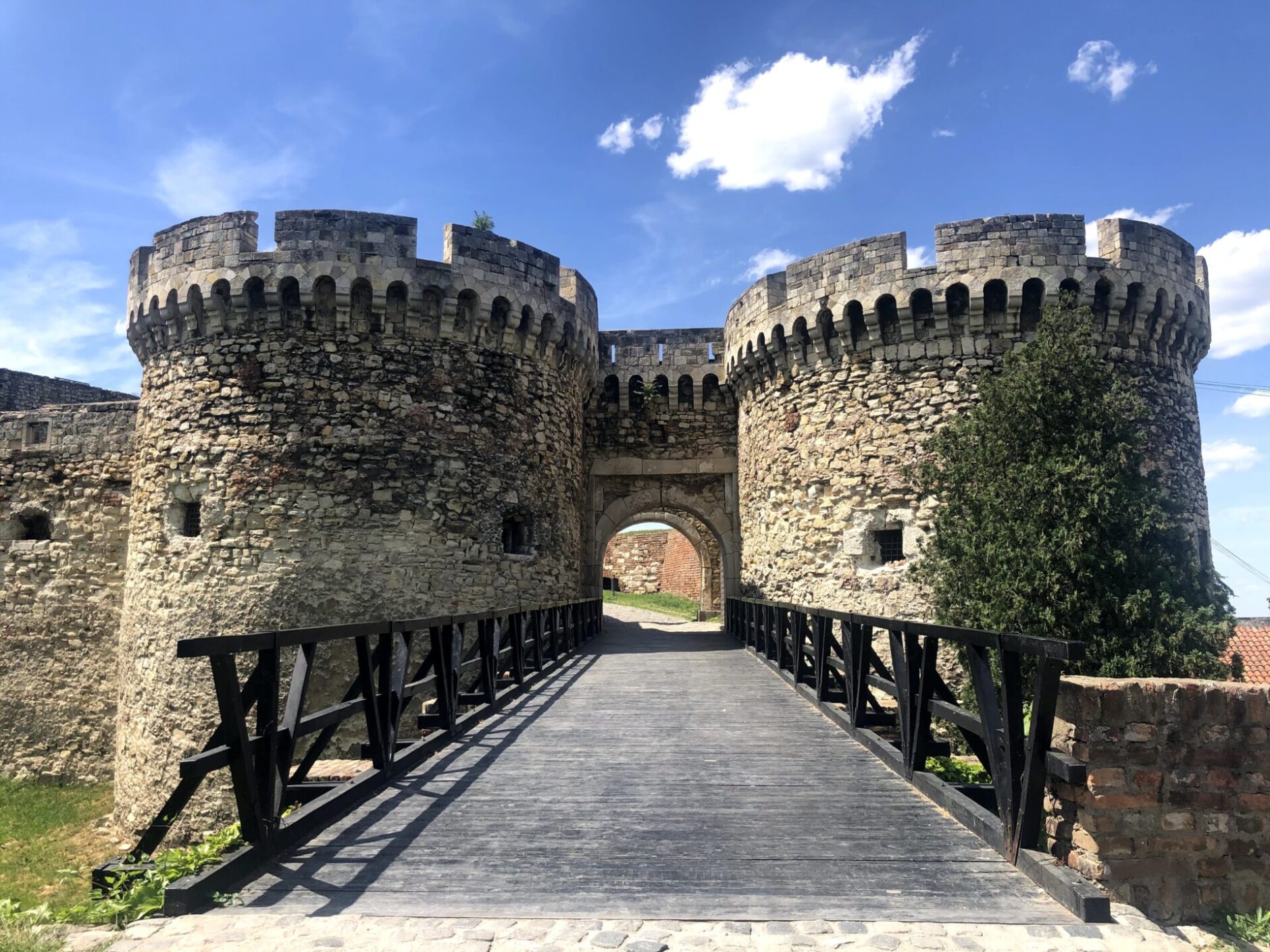 Bridge leading to two Medieval stone towers