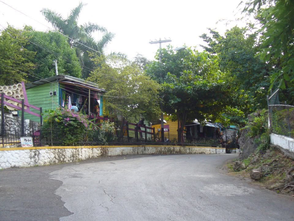 Row of shops with red tile roofs on Hip Strip road in Montego Bay in Jamaica